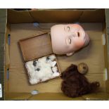 early 20th Century porcelain dolls head: marked Am Koppelsdon Germany 996 A 12 m together with