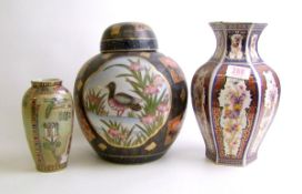 A large oriental ginger jar: together with 2 similar vases, height if tallest 26cm (3).