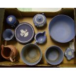 A collection of Wedgwood jasper ware to include: planters, large fruit bowl, lidded sugar bowl,