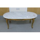 Marble topped oval coffee table: with gold effect legs