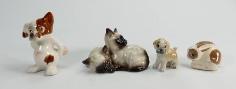 A collection ceramic animals to include: Cats Dogs and Rabbits(4)