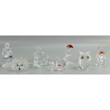 Swarovski Small Boxed Figures to include: Dinosaur, Hedge Hog, Owl, Toucan , Pink Flower,
