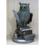 Veronese bronzed model of a wise owl with books, owl height 22cm.