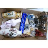 A collection of Oriental style resin and pottery figures (12):