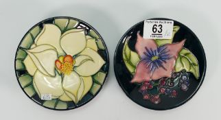 Two floral decorated Moorcroft coasters: dated 1999 and 2001 (2)