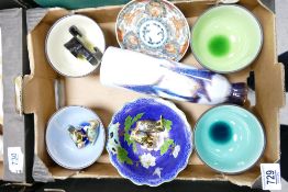 A mixed collection of items to include: glazed rice bowls, enamelled figures of birds,