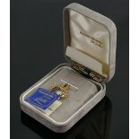 9ct gold pendant with revolving semi precious stone: from Beaverbrooks,overall weight 4.5g.