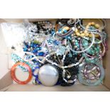 A collection of vintage costume jewellery: including bangles,