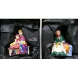 Royal Doulton figures Autumn Breezes HN4716 and two miniature street Vendor figures.