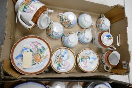 A collection of oriental theme eggshell tea ware: