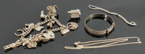 A collection of Silver jewellery: including charm bracelet, bangle, chains etc, 55g.