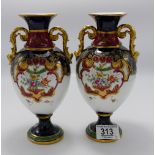 Pair of porcelain LM & Co hand gilded vases: height 20cm.