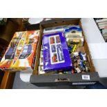 A mixed collection of items to include: boxed toy cars,