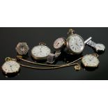A collection of vintage pocket watches:including a ring watch,