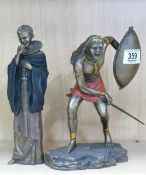 Bronzed resin figures of Masai Warriors: height of tallest 24cm.
