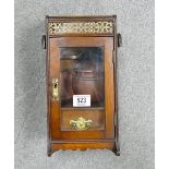 Oak smokers cabinet with tobacco jar: Jar has large chip to rim.