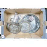 A collection of Asian metal ware: to include brass and copper plaques,