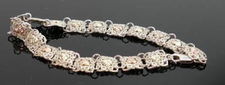 Silver ornate bracelet, 9.