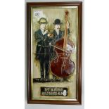 A large framed tile of street musicians: 44cm x 23.