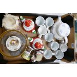 A mixed collection of pottery to include: quantity of dog mugs, Santa Claus teapots,