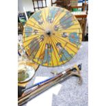 A collection of vintage walking sticks: banded item noted together with oriental parasol (some