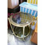 Mid Century Brass Effect circular hostess trolley: with smoked glass shelves