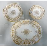 A collection of early 20th century Coalport raised gilded dinner ware: Comprising large platter,