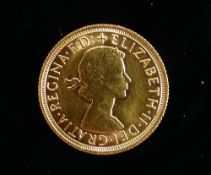 1963 gold full sovereign: Elizabeth II and St George and the dragon.