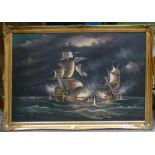 Large gilt framed galleon battle scene:90 x 60cm