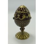 Enamelled musical egg on stand: height 17cm