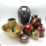 A collection of studio pottery to include: vases, high fired bowls, lidded boxes etc.