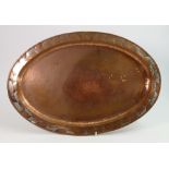 Hugh Wallis Arts and Crafts hand beaten oval Copper tray: Length 50cm.