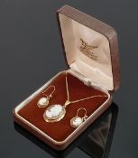 9ct gold mounted cameo brooch and chain: With matching pair of earrings, 7.3g.