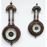 Two 19th century carved Walnut Barometers: The larger one 56cm and smaller 44cm.