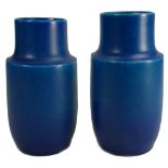 A pair of Royal Lancastrian mottled blue pottery vases: height 21cm.