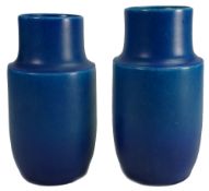 A pair of Royal Lancastrian mottled blue pottery vases: height 21cm.