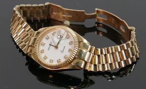 9ct gold ladies Geneve quartz wrist watch with 9ct gold bracelet: Gross weight 46.6g.