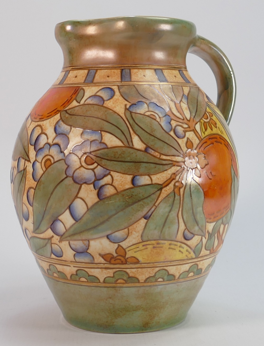 Large Charlotte Rhead Bursley ware water jug: Decorated with oranges & foliage, height 24cm.