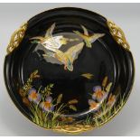 Carltonware fruit bowl decorated with enamelled flying mallard ducks: On black ground,