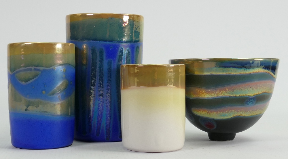 A collection of studio pottery vases: All by Marjorie Clinton in metalised glazes,