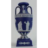 Wedgwood dark blue dip Jasperware handled vase: Split noted to base, height 20cm.