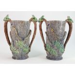 Pair of 19th century Palissy Majolica two handled vases: Each decorated with snakes,