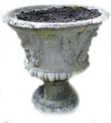 Large stone 2 piece garden planter: Decorated with foliage, height 61cm.