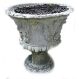 Large stone 2 piece garden planter: Decorated with foliage, height 61cm.