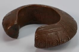 Tribal Art - an African gilt patinated bronze bangle or torc, possibly Benin,