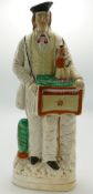 Large 19th century Staffordshire figure The Hurdy Gurdy man: Standing 39cm high.