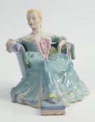 Wade underglazed figure of a lady in a dress seated on an armchair: Height 18.5cm.