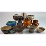 A collection of studio pottery items to include: Vases, bowls & dishes, height of tallest 18cm.