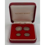 Maundy Money: A set of four Edward VII silver coins dated 1902.