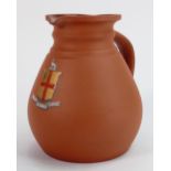 Wedgwood Terracotta jug decorated with a coat of arms: Height 17cm.